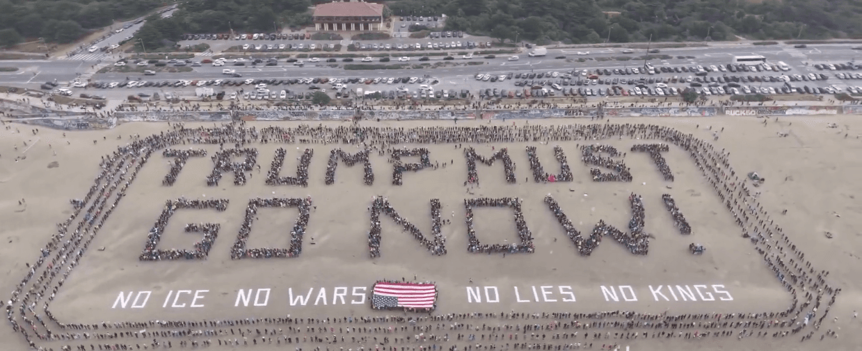 human banner spelling out "Trump must go now! No ICE, no lies, no wars, no kings"